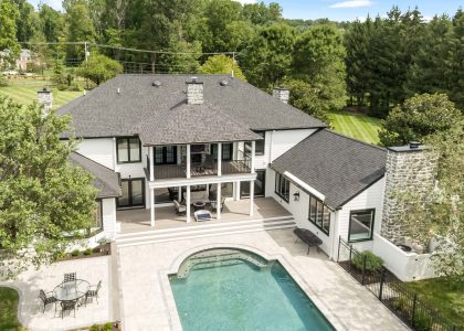 Malvern Renovation exterior back of home with pool view